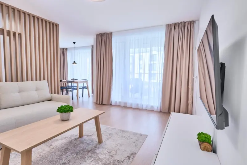 Izba Altitude Apartment 2655 Gerlach v Tatra Suites Holding, s.r.o. – Obývačka a rozkladací gauč